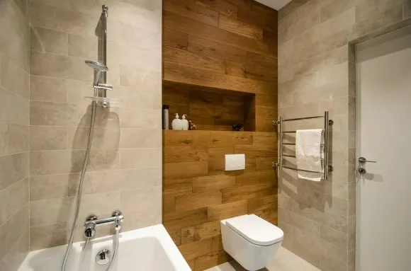 Отделка стен ванной комнаты стеновыми панелями ламинат