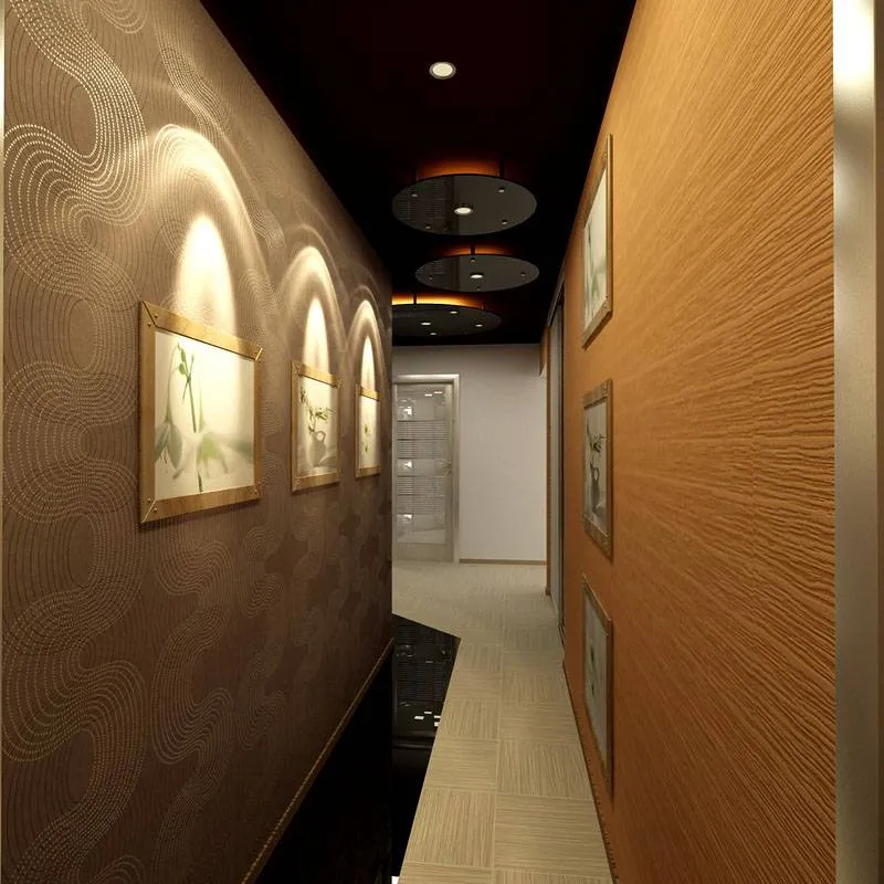 Интерьер узкого помещения можно разнообразить при помощи декора на стенах, оригинальной подсветки и оформления напольного покрытия