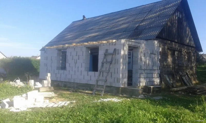 Пеноблочная пристройка к деревянному дому